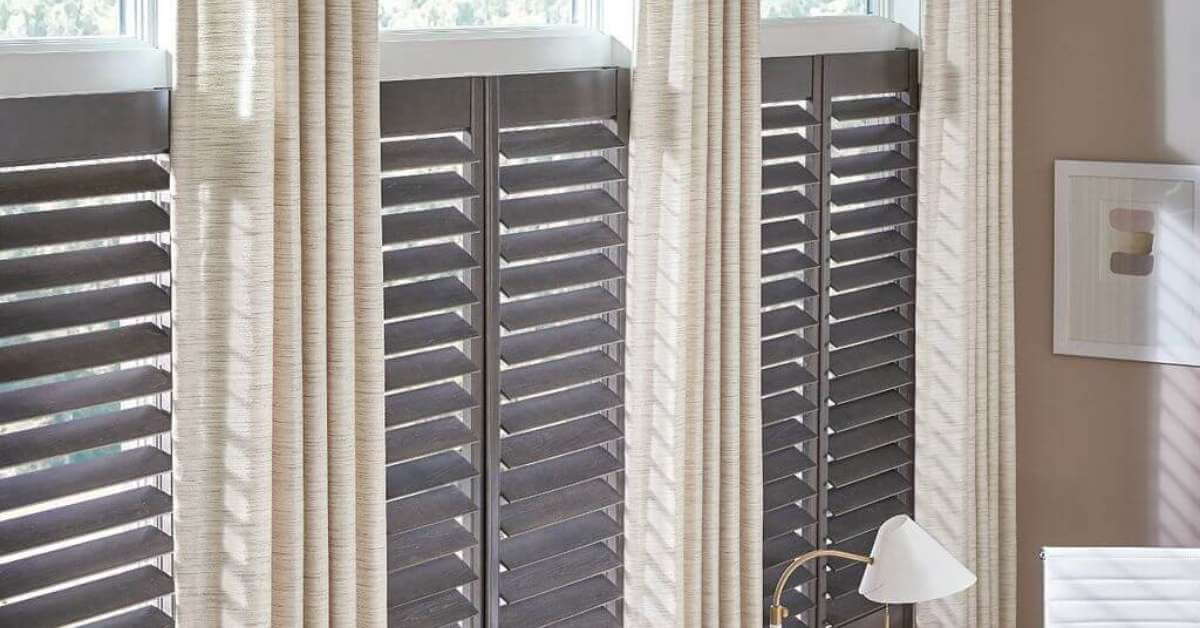 Combining shutters with curtains offers numerous advantages, making this pairing a staple in modern home improvement projects.