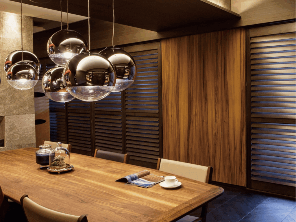 Dark Wood Tone Shutters In A Home