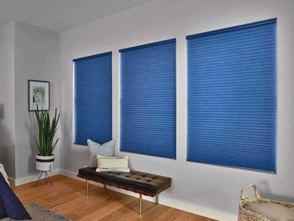 Cellular shades, also known as honeycomb shades, are among the most effective insulating window coverings available. Their signature design features small, structured air pockets that act as natural insulation, forming a thermal barrier that traps warm air indoors.